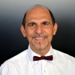 Dr. George John Georgiou,