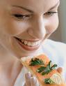 woman_eating_fish.jpg
