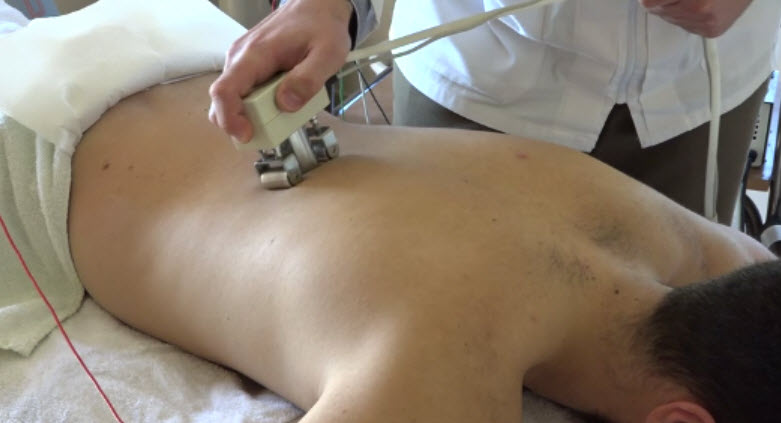 Matrix Regeneration Therapy applied to a patient’s back